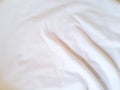 Wrinkles of white sheets bed for the background Royalty Free Stock Photo