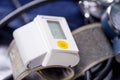 Wrist blood pressure monitor showing normal blood pressure, medical concept