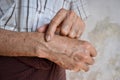 Wrist joint of Asian elder man. Concept of joint pain, arthritis or  hand problems Royalty Free Stock Photo