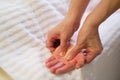 Wrist massage. massage therapist puts pressure on a sensitive point on a woman& x27;s hand. Physiotherapist massaging her