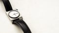 A wrist watch with black straps on a white background Royalty Free Stock Photo