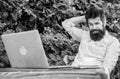 Write article for online magazine. Man looking for inspiration. Find topic write. Bearded hipster laptop surfing Royalty Free Stock Photo