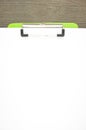 Write blank paper clip on green clipboard Royalty Free Stock Photo