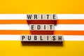 Write edit publish word concept on cubes Royalty Free Stock Photo
