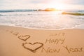 Write happy new year 2019 on beach