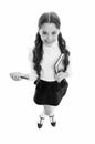 Write note to remember. Child school uniform smart kid happy make note. Child girl happy school uniform clothes holds Royalty Free Stock Photo
