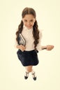 Write note to remember. Child school uniform smart kid happy make note. Child girl happy school uniform clothes holds