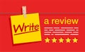 Write a Review - Note paper hung on a clothespin