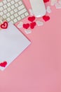 Write wish on white piece of paper for Valentines day on February 14. Celebrate Valentines day. Office flat lay with red toy