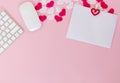 Write wish on white piece of paper for Valentines day on February 14. Celebrate Valentines day. Office flat lay with red toy