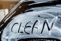 Write the word clean on the windshield washes. Royalty Free Stock Photo