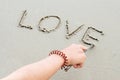 Write the word love letters on the sand Royalty Free Stock Photo