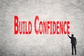 Write words on wall, Build Confidence