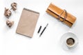 Writer acsessories. Vintage notebook, pen, crumpled paper and coffeee on white background top view mockup