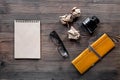 Writer acsessories. Vintage notebook, pen, crumpled paper and glasses on white background top view mockup