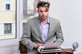 Writer or businessman wearing grey suit. Man with curious face Royalty Free Stock Photo