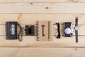 Writer, journalist or traveler desk - tape recorder, notepad and photo camera on the wooden background Royalty Free Stock Photo