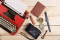 Writer or journalist workplace - vintage red typewriter on the wooden desk Royalty Free Stock Photo