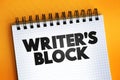 Writer`s block text quote on notepad, concept background