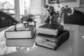 Writer`s table with books and flowers