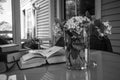 Writer`s table with books and flowers
