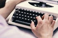 Writer typing with retro writing machine. Old typewriter Royalty Free Stock Photo