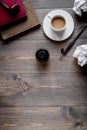 Writer workplace with tools on wooden background top view mock up