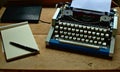 Writers block, Old typewriter with a notebook and a pen Royalty Free Stock Photo