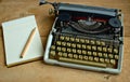 Writers block, Old typewriter with a notebook and a pen Royalty Free Stock Photo