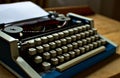 Writers block, Old typewriter on a antic wooden table Royalty Free Stock Photo