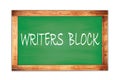 WRITERS BLOCK text written on green school board