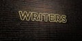 WRITERS -Realistic Neon Sign on Brick Wall background - 3D rendered royalty free stock image