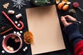 Writes Christmas shopping list, coffee, sweets, mockup Royalty Free Stock Photo