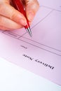 Writing blank delivery note with pen Royalty Free Stock Photo