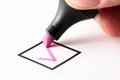 Writing checkmark in checkbox in checklist. Completed and finished task. Royalty Free Stock Photo