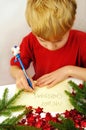 Writing Christmas wishes Royalty Free Stock Photo