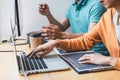 Writing codes and typing data code technology, Programmer cooperating working on web site project in a software developing on Royalty Free Stock Photo
