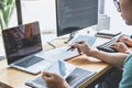 Writing codes and typing data code technology, Programmer cooperating working on web site project in a software developing on Royalty Free Stock Photo