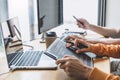 Writing codes and typing data code technology, Programmer cooperating working on web site project in a software developing on Royalty Free Stock Photo