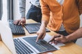 Writing codes and typing data code technology, Programmer cooperating working on web site project in a software developing on Royalty Free Stock Photo
