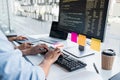 Writing codes and typing data code technology, Programmer cooperating working on web site project in a software developing on Royalty Free Stock Photo