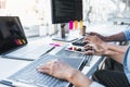 Writing codes and typing data code technology, Programmer cooperating working on web site project in a software developing on Royalty Free Stock Photo