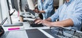 Writing codes and typing data code technology, Programmer cooperating working on web site project in a software developing on Royalty Free Stock Photo