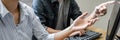 Writing codes and typing data code technology, Programmer team working on web site project in a software development on desktop Royalty Free Stock Photo