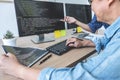 Writing codes and typing data code technology, Two professional programmer cooperating working on web site project in a software Royalty Free Stock Photo