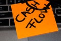Writing on colorful sticky note Cash flow. Text with cash flow on paper. Sticky note, post it on keyboard. Glasses on post it with Royalty Free Stock Photo