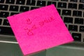 Writing on colorful sticky note Just smile. Text with just smile on paper. Sticky note, post it on keyboard Royalty Free Stock Photo