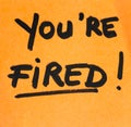 Writing on colorful sticky note you are fired. Text with you are fired on paper Royalty Free Stock Photo