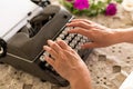 Writing concept. Hands typing on retro typewriter. Royalty Free Stock Photo