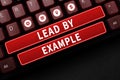 Writing displaying text Lead By Example. Concept meaning Be a mentor leader follow the rules give examples Coach Royalty Free Stock Photo